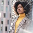 African american woman standing outdoors.
